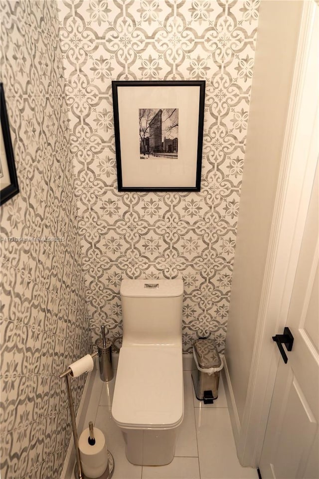 bathroom with tile patterned floors and toilet