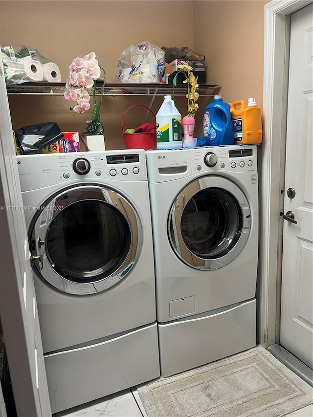 laundry room featuring washer and dryer