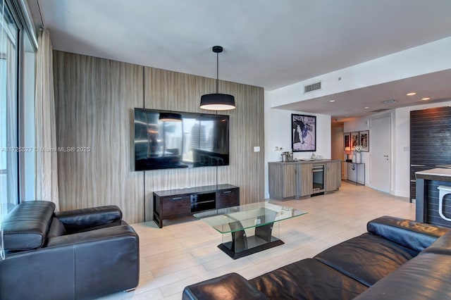 living room featuring beverage cooler