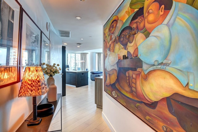 hallway featuring light hardwood / wood-style flooring