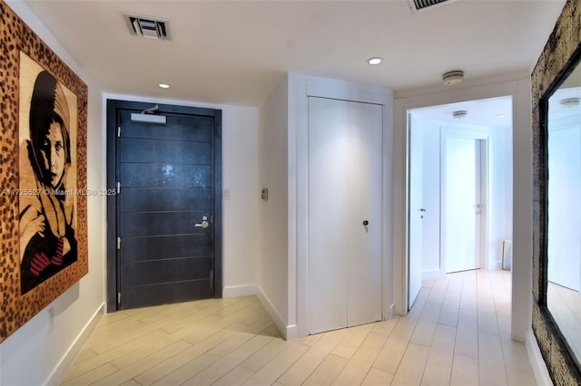 hall featuring light wood-type flooring