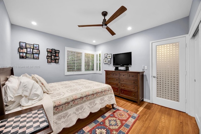 bedroom with a closet, ceiling fan, and light wood-type flooring