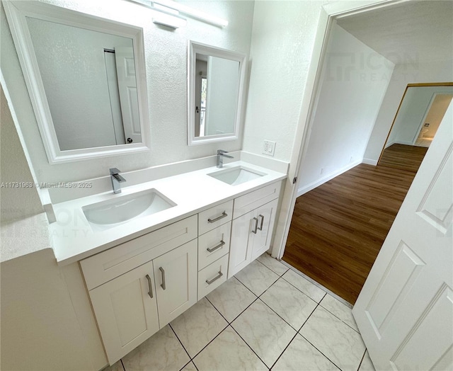 bathroom with vanity and tile patterned floors