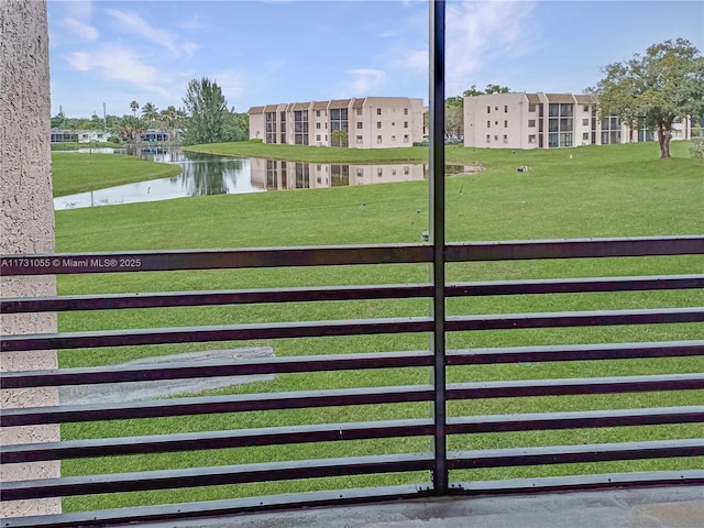 view of yard with a water view