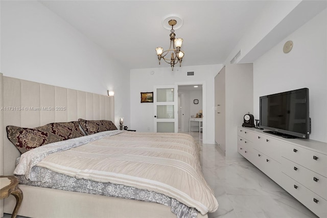 bedroom featuring a chandelier