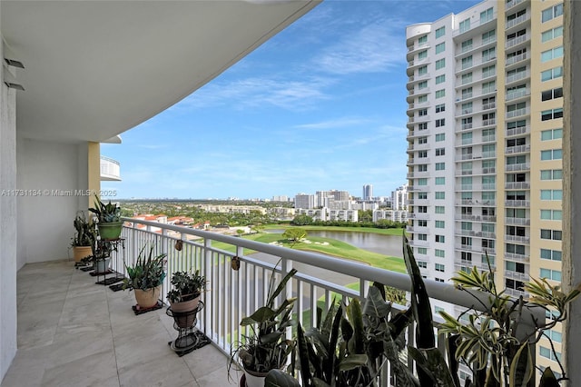 balcony featuring a water view