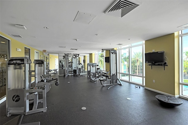 exercise room with a wall of windows