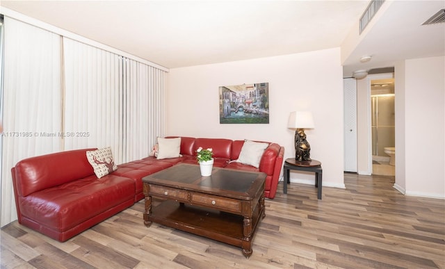 living room with hardwood / wood-style flooring