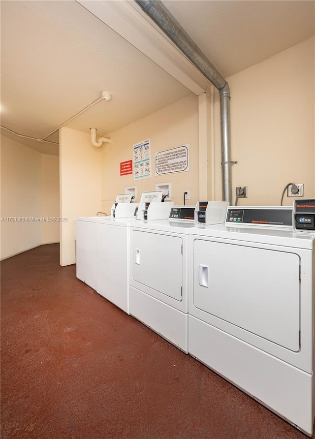 laundry room featuring washer and clothes dryer