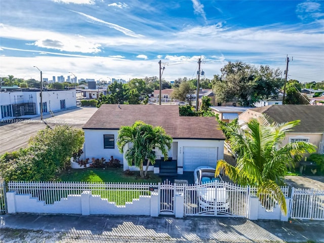 single story home featuring a garage