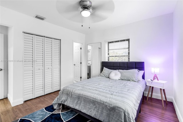 bedroom featuring hardwood / wood-style floors and ceiling fan