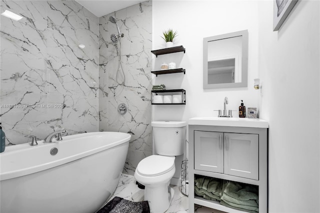 bathroom with vanity, toilet, and a tub to relax in