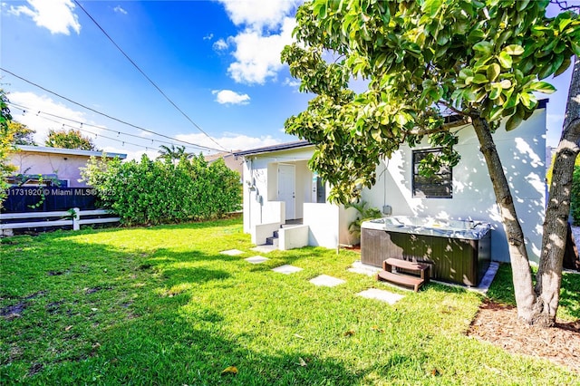 view of yard featuring a hot tub