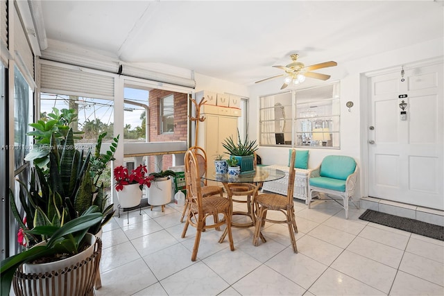 sunroom / solarium with ceiling fan