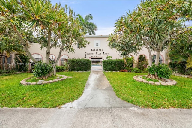 exterior space with a front lawn