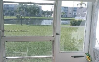 doorway with a water view