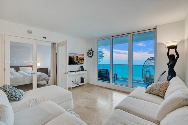 living room with a wall of windows