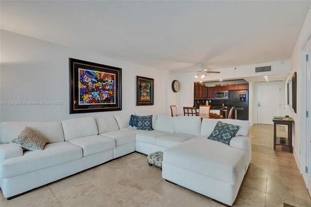 living room with ceiling fan