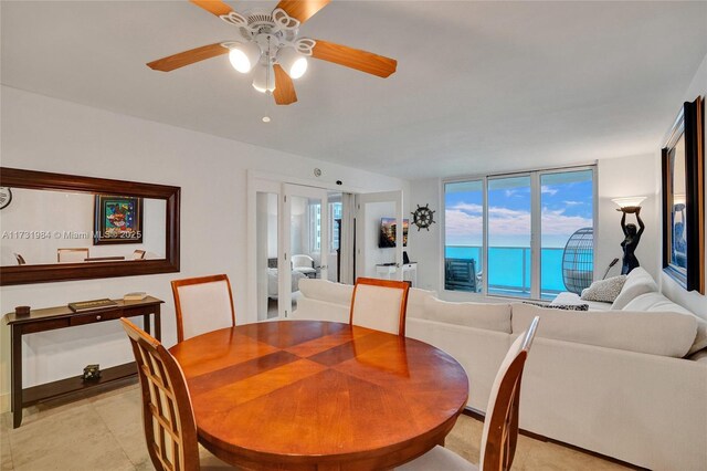 dining area featuring plenty of natural light and ceiling fan