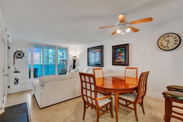 dining area with ceiling fan