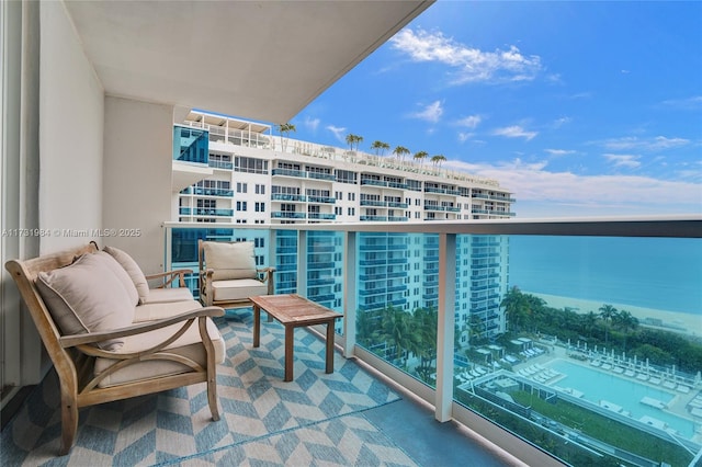 balcony featuring a water view