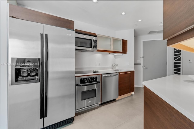 kitchen featuring appliances with stainless steel finishes and sink