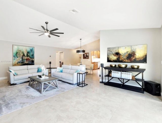 living room featuring vaulted ceiling and ceiling fan