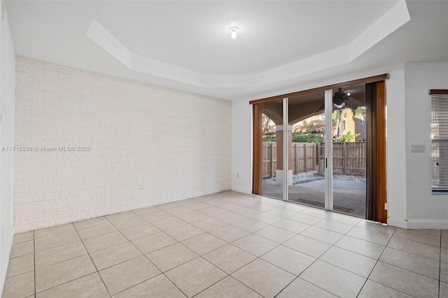 full bathroom with tile patterned flooring, vanity, tiled shower / bath combo, and toilet