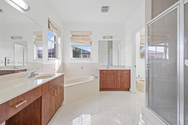 bathroom with vanity and tile patterned floors