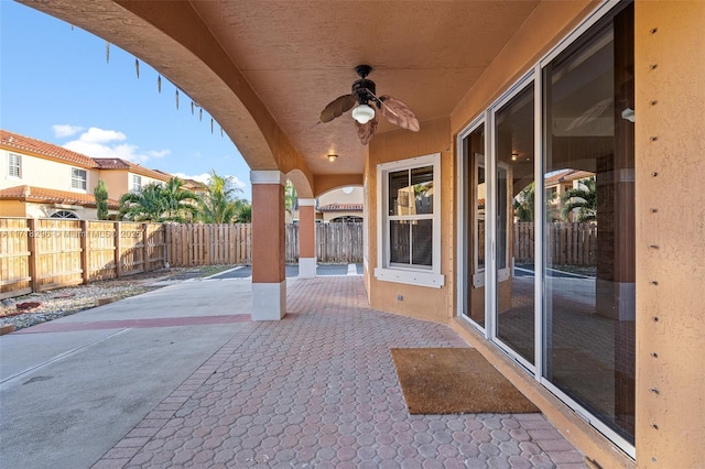 view of patio / terrace featuring ceiling fan