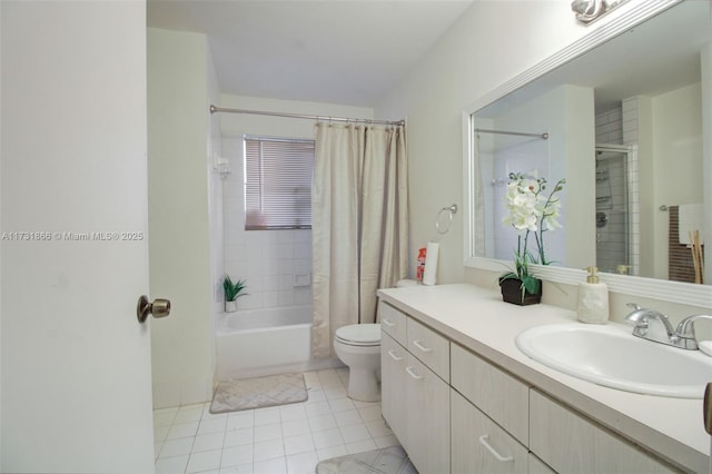 full bathroom with vanity, tile patterned floors, toilet, and shower / bath combo