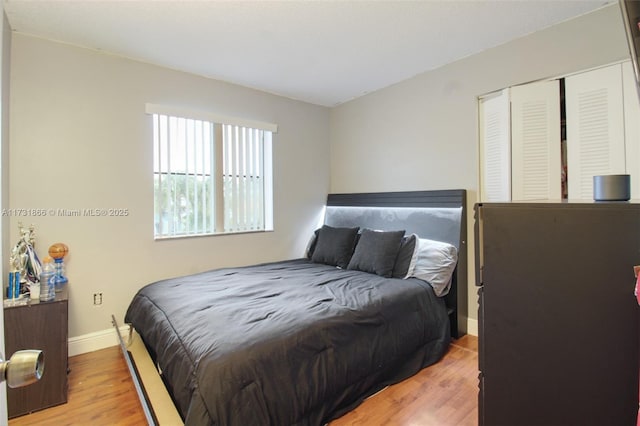 bedroom with light hardwood / wood-style floors