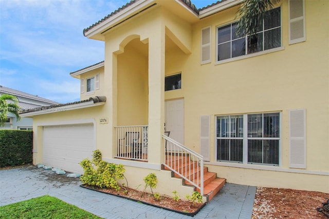 entrance to property with a garage