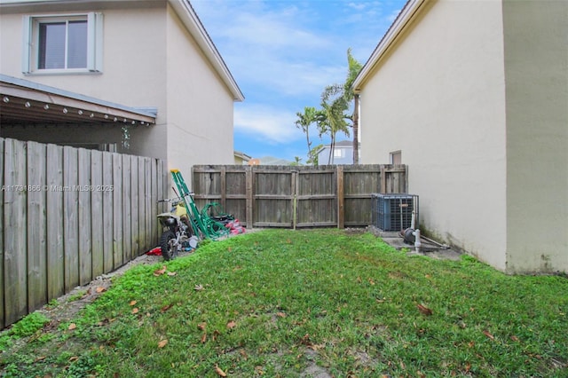 view of yard featuring central AC unit