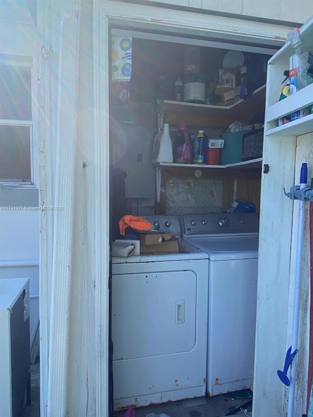 washroom featuring washing machine and dryer