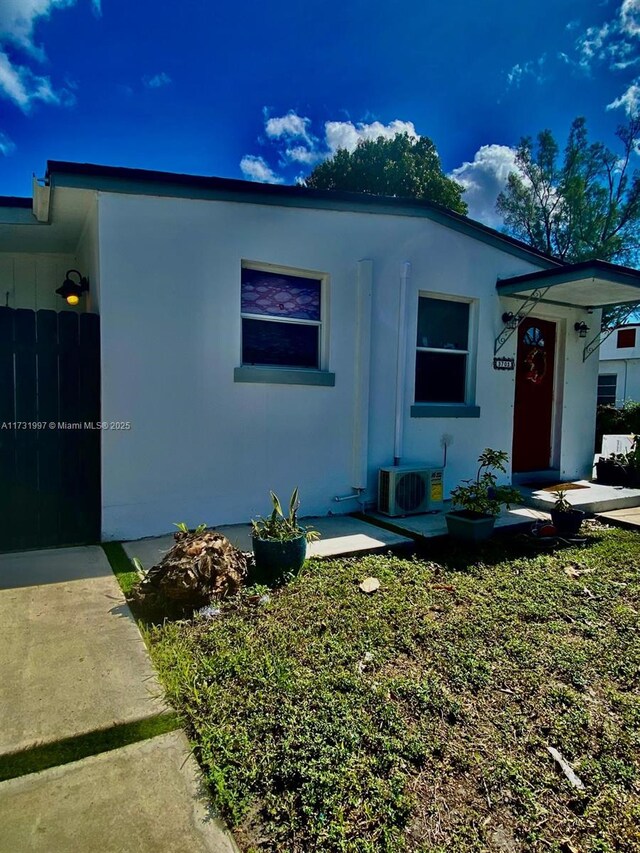 view of front of house featuring ac unit