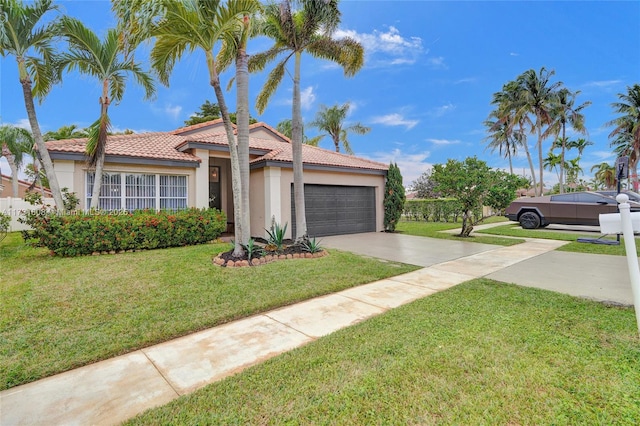 view of front facade featuring a garage and a front yard