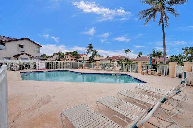 view of swimming pool featuring a patio