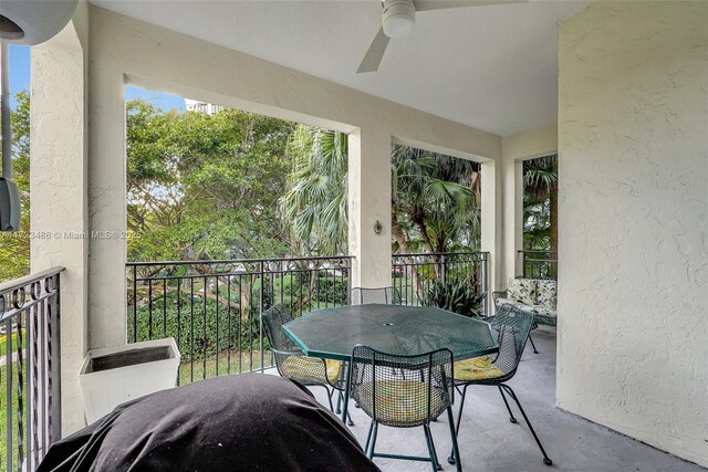 sunroom / solarium with ceiling fan