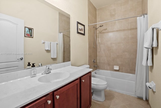 full bathroom with tile patterned floors, toilet, shower / tub combo, and vanity