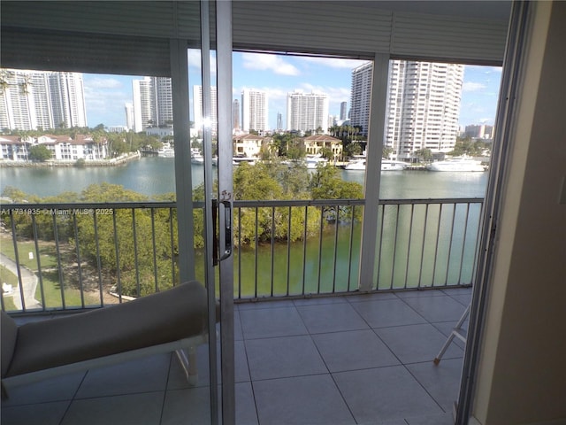 balcony featuring a water view