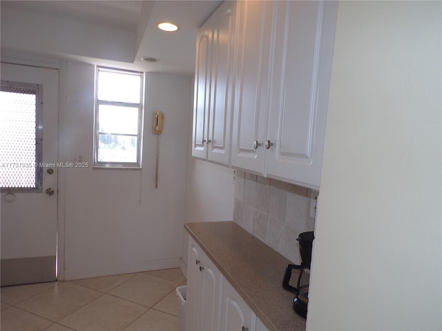 interior space with light tile patterned flooring