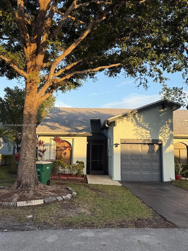 ranch-style house with a garage