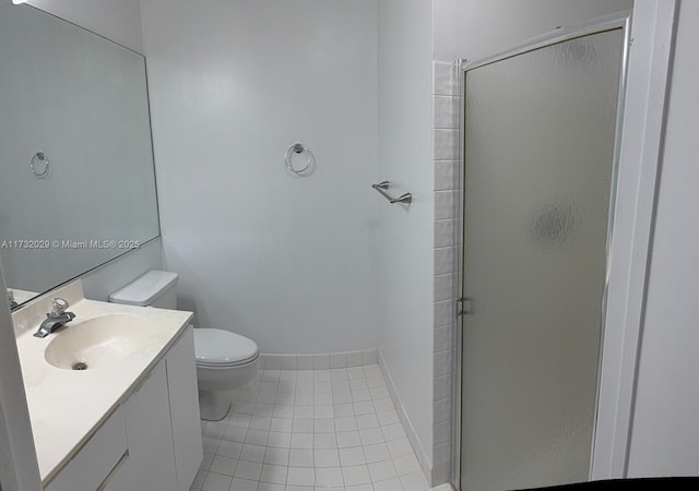 full bath with toilet, a stall shower, vanity, tile patterned flooring, and baseboards