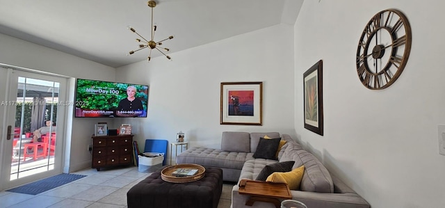 tiled living room featuring vaulted ceiling and a notable chandelier