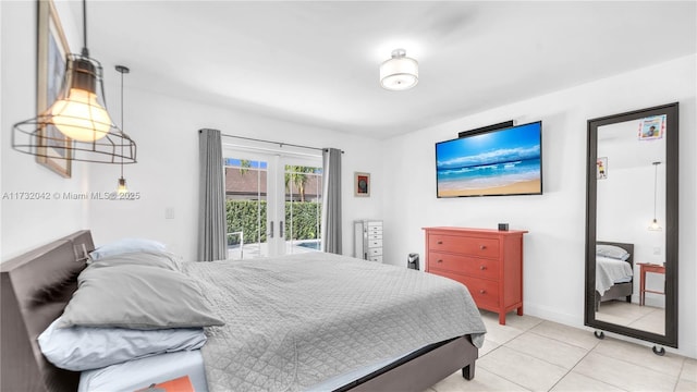 bedroom with light tile patterned flooring, access to exterior, and french doors