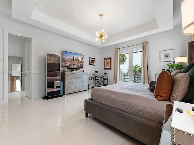 bedroom with light tile patterned flooring, access to exterior, a raised ceiling, and a notable chandelier