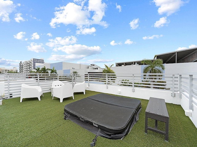 exterior space featuring a covered hot tub