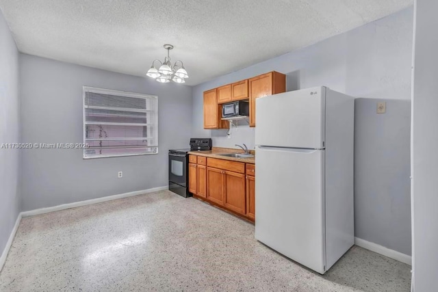 kitchen with sink, a notable chandelier, black appliances, a textured ceiling, and decorative light fixtures