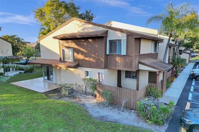 view of home's exterior with a lawn, a patio, and central air condition unit